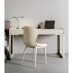 a white desk with a laptop on it and a chair in front of the desk