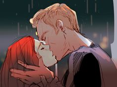 a man and woman kissing in the rain with their faces close to each other's foreheads