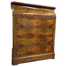 an antique chest of drawers with wood inlays