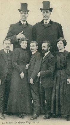 an old black and white photo of several people