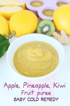 an apple, pineapple and kiwi fruit puree in a bowl next to some cut up lemons