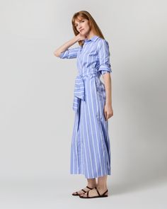 A crisp, easy dress to wear on repeat all summer long. Think of it as relaxed riff on our favorite shirtwaist shape, with a flattering wrap-around tie at the waist and slide slits for beautiful movement when you walk. It’s made up in striped Italian poplin, and to seal the deal on the whole perfect summer dress thing, it’s finished with discreet pockets. Easy Dress, Bold Stripes, Work Wardrobe, The Deal, On Repeat, Shirtdress, Simple Dresses, Perfect Summer, Sweater Skirt