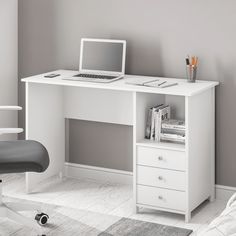 a white computer desk with a laptop on it