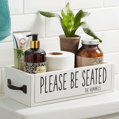 a bathroom shelf with toiletries and soaps on it