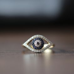 14K Solid Gold Evil Eye Ring, Sterling Silver Evil Eye Ring, Handmade Evil Eye Ring, Women's Ring, Valentine's Day Gift, Mother's Day Gift ☛ 𝐈𝐦𝐩𝐨𝐫𝐭𝐚𝐧𝐭 𝐭𝐨 𝐍𝐨𝐭𝐞:    ➛ You will get high quality hand-made crafted and sparkly jewelry when you purchase item here. ➛ The Moissanite jewelry in my shop is made with the best quality and highest grade D color (the D color in the Moissanite is a relatively rare, colorless and precious.) ➛ This brilliant ring is made to order by 9K/14K/18K soli Evil Eye Ring Silver, Evil Eye Ring Gold, Brilliant Ring, Handmade Evil Eye, Jewelry Details, Sparkly Jewelry, Evil Eye Ring, Eco Friendly Jewelry, Ring Ideas