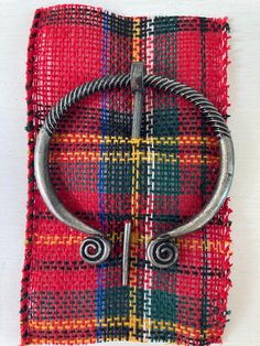 Use this the Celtic brooch as a cape clip or sweater clip, suitable for most knitted or crocheted open knit garments. The shawl pin can also be clipped to a variety of clothing, such as your scarf, cloak, shawl, cardigan, sweater, cape and more. Vintage and Delicate: This shawl pin features classic Celtic elements adding appeal and beauty to everyday wear The pin is easy to operate and is made of quality alloy material, sturdy and serviceable, not easy to deform or break. Scottish Shawl, Celtic Elements, Celtic Brooch, Cloak Pin, Knit Garments, Sweater Cape, Sweater Clip, Shawl Pin, Jewelry Brooch