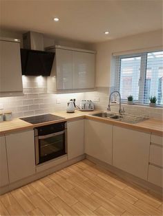 the kitchen is clean and ready for us to use in its new owner's home