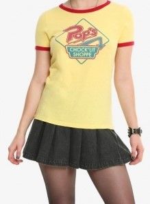 a woman wearing a yellow shirt and black skirt with the words pops clock phone on it