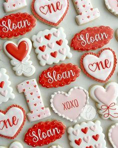 valentine's day cookies are arranged on a table