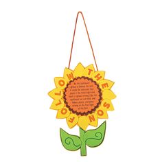 a paper sunflower hanging from a string with the words, what do you know?