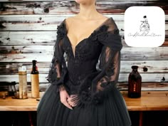 Women's Black Tulle Evening Dress | Off-Shoulder with Long Sleeves | Ladies Clothes Outfit The size chart is smaller than the regular size please add 2-3 cm.  If you have any questions, don't hesitate to contact us, we are quick to reply. Refund & returns: We accept refunds in case the item comes defective, up to 7 days from package arrival. However, we do not accept returns for size-related issues or any damages caused by the buyer. Processing & Delivery: We usually process orders within 1-3 business days and then dispatch them, delivery usually takes between 7-14 business days - 100% Satisfaction Guarantee - Premium Quality Products - 24/7 Customer Support Black Pink Wedding Dress, Black Silk Wedding Dress, Black Vintage Wedding Dress, Black And Maroon Wedding Dress, Black Floral Wedding Dress, Salem Elopement, Black Wedding Dress With Sleeves, Black Fantasy Gown, Vampire Wedding Dress