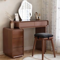 a wooden desk with a mirror and stool