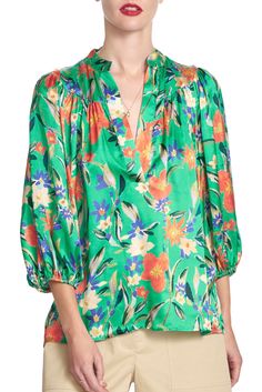 The Corinne top features an elegant V neck with placket and a yoked shoulder with a 3/4 length blouson sleeve. Here, it is presented in our Brushed Floral print on satin with body and yoke lining included. **FINAL SALE** Content: 70% cotton / 30% poly Color: Fern Fits: Close fit. Take your normal size. Sizes: XS-L What we Love: Great print, perfect blouse. Made in Los Angeles with Love Patricija is 5'10" size 2 and is wearing a size S xs s m l length 23.5 24 24.5 25 sweep 41.5 43.5 45.5 48.5 bus Teal Tie, Perfect Blouse, Blouson Sleeve, Women's Button Down Shirt, Orange Blouse, Animal Print Blouse, Flowy Blouse, Bell Sleeve Blouse, Weekend Style