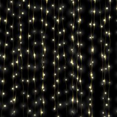 a black background with yellow lights on the strings and in the center is an abstract pattern