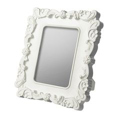 a white frame with an ornate design on the bottom and sides, in front of a white background