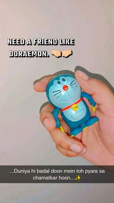 someone is holding a toy in their hand with the caption need a friend like doramon