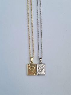 PLEASE NOTE:  - Price is for one necklace (£7.50).  - 2 Piece G/S Set: includes one gold and one silver necklace (£13.50) Matching earrings found on my page :) https://www.etsy.com/uk/listing/1210353417/ace-of-hearts-earrings-anime-drop Ace of hearts necklace, Poker necklace, LQBTQ necklace, matching necklace. These mini dainty necklaces are simple yet beautiful. A perfect treat yourself gift or a gift for a loved one! Necklace chain is approx. 40 cm (15.7 inches) with 5cm extending chain.  Gold Ace Necklace, Relationship Necklaces, October Jewelry, Matching Necklaces For Couples, Dainty Jewellery, Dainty Necklaces, Ace Of Hearts, Bff Necklaces, Best Friend Jewelry