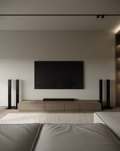 a large flat screen tv sitting on top of a wall