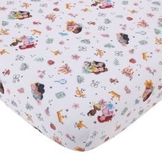 a white bed sheet with winnie the pooh and friends on it's side