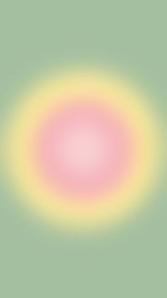 an image of a pink and yellow circle in the middle of a light green background