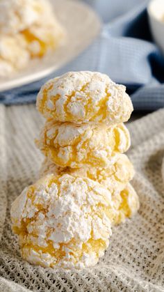 lemon crinkle cookies stacked on top of each other