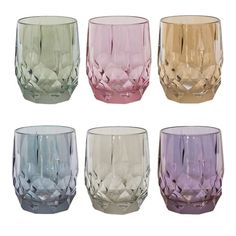 six different colored glass tumblers sitting next to each other