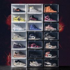 a display case filled with many pairs of shoes in different colors and sizes on top of each other