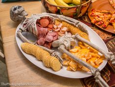 a plate with food on it sitting on a table next to other plates and bowls