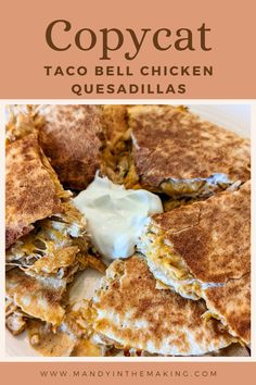 copycat taco bell chicken quesadillas recipe on a plate with sour cream