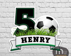 the number five with soccer ball and grass in front of a white brick wall background