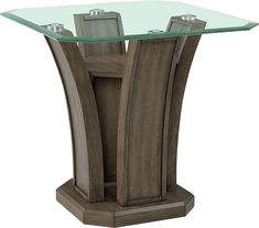 a glass top table with wooden legs