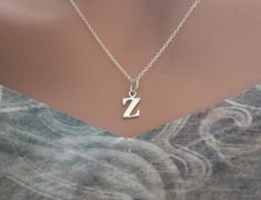 Please add 2-3 additional days to Etsy's Estimated Delivery Calculator found on the right side of the page. While sometimes the packages arrive within this schedule, many times Etsy has underestimated the delivery time by a couple of days This is a beautiful Sterling Silver Lowercase Z Initial Charm Necklace. Both the charm and the chain are made from sterling silver. :) Please look at the measurements of the charm before ordering. Photos can sometimes make charms appear larger or smaller than t Z Necklace, Z Initial, Z Letter, Gold Bracelets Stacked, Letter Charm Necklace, Necklace Initial, Bear Pendant, Small Jewelry Box, Birthstone Charms