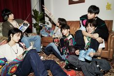 group of young people sitting on couches in living room