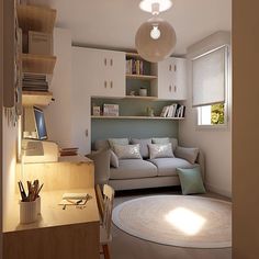 a living room filled with furniture and a white rug on top of a hard wood floor