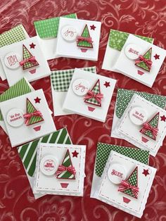 some christmas cards are arranged on a table