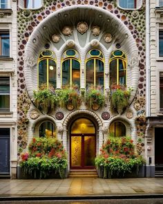 the entrance to an old building with flowers growing on it