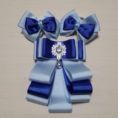 Set of tie and two bows.  Navy blue and blue color.  Bows are 7,5cm and on hair band. Tie are attached to a pin. All orders are shipped Lietuvos Pastas with tracking number. Custom requests are gladly accepted. Please check out the rest of my shop for additional hair accessories. Thank you. http://www.etsy.com/shop/ForYourPrincesses PLEASE NOTE: if you need an item by a specific date please message me prior to ordering to discuss. Thank you. Adjustable Blue Satin Bow, Adjustable Blue Bow With Ties, Blue Adjustable Bow With Ties, Adjustable Blue Bow Ties, Blue Bow Tie With Ribbon As A Gift, Adjustable Blue Bow With Ribbon, Adjustable Blue Ribbon Bow, Blue Bow Ties For Gifts, Formal Blue Ribbon Bow Tie