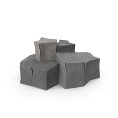 three concrete blocks stacked on top of each other in the shape of hexagonal shapes