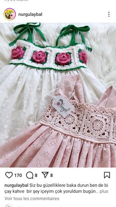 the dress is pink and green with flowers on it