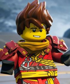 the lego movie character is dressed in red and yellow