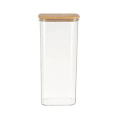 a glass container with a wooden lid