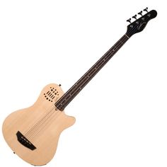 a small wooden guitar sitting on top of a white surface