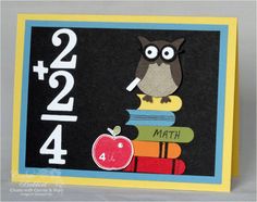 an owl is sitting on top of books and has the number four in front of it