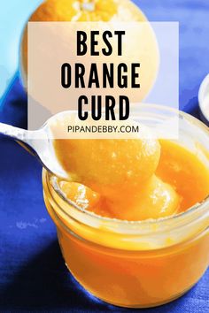 an orange curd in a glass jar with a spoon full of it and the words, best orange curd