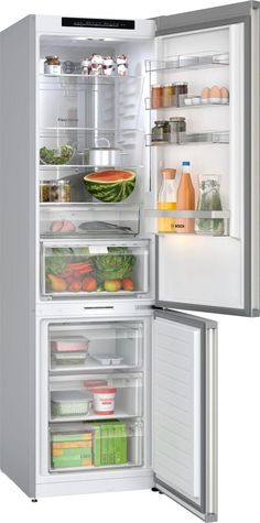 an open refrigerator with the door wide open and food inside it, including fruits and vegetables