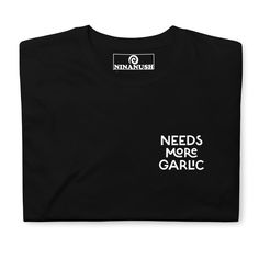 NEEDS MORE GARLIC 🌟 This funky foodie t-shirt is the perfect shirt for garlic lovers and foodies of all kinds. It's a classic cotton shirt that's soft and comfortable with the words "Needs more garlic" expertly printed on the front. Add a little personality to your everyday style in this garlic enthusiast t-shirt or give it as a funny gift for a quirky tee aficionado. It's a unique food tee, designed by Nina and made just for you. • 100% ring-spun cotton • Dark Heather is 65% polyester, 35% cot Pizza T Shirt, Everyday Streetwear, Happy Logo, Babe T Shirt, Pizza Tshirt, Pickled Garlic, Logo Style, Weird Holidays, Vegan Foodie