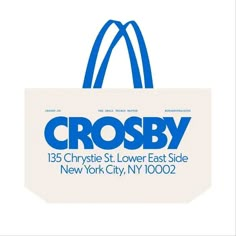 a blue and white bag with the words crossby on it's front side