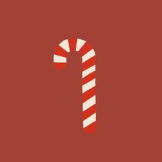 a candy cane on a red background