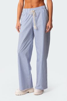 Pants Relaxed fit Elastic tie waist Pinstriped pattern Matching set 100% Cotton Model wears size S Model height is 5'9 Item care: Wash with similar color Striped Linen Pants, Summer Lounge, Pant Trends, Pinstripe Pants, Printed Wide Leg Pants, Summer Pants, Pants Casual, Striped Linen, Striped Pants