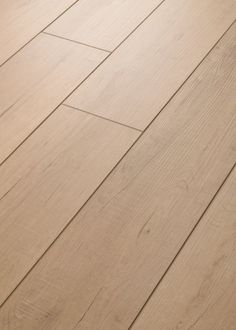 an image of wood flooring that looks like it has been painted in light brown